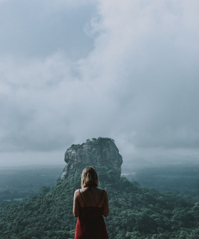 Standing at the top of the mountain of the red woman
